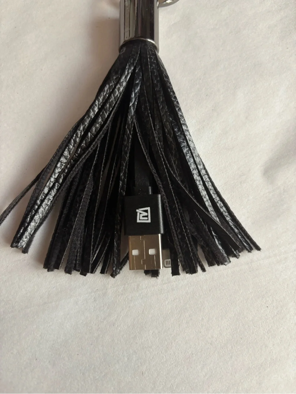 Remax faux leather black tassel USB A lightning cord charging adapter keychain